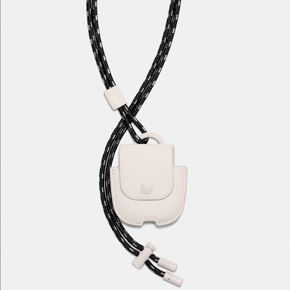 Coach earbud case in chalk